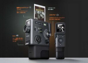富士フイルムが、8mmフィルムカメラ風デザインの動画対応チェキ「instax mini Evo Cinema」を発表。10の時代を表現できる「ジダイヤル」搭載。